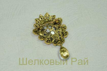 Брошь декоративная Звезда Востока с синем камнем