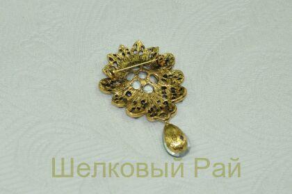 Брошь декоративная Звезда Востока с зеленым камнем