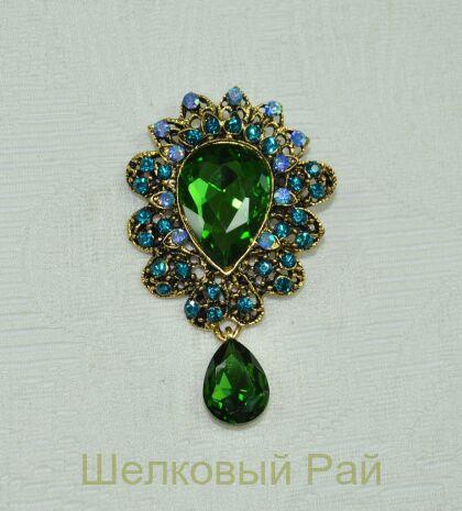 Брошь декоративная Звезда Востока с зеленым камнем